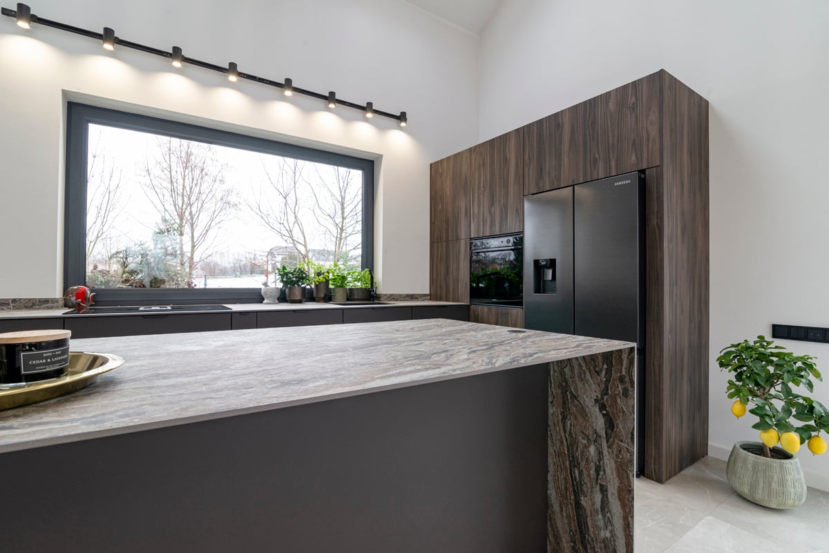 Kitchen with track lighting and panoramic window